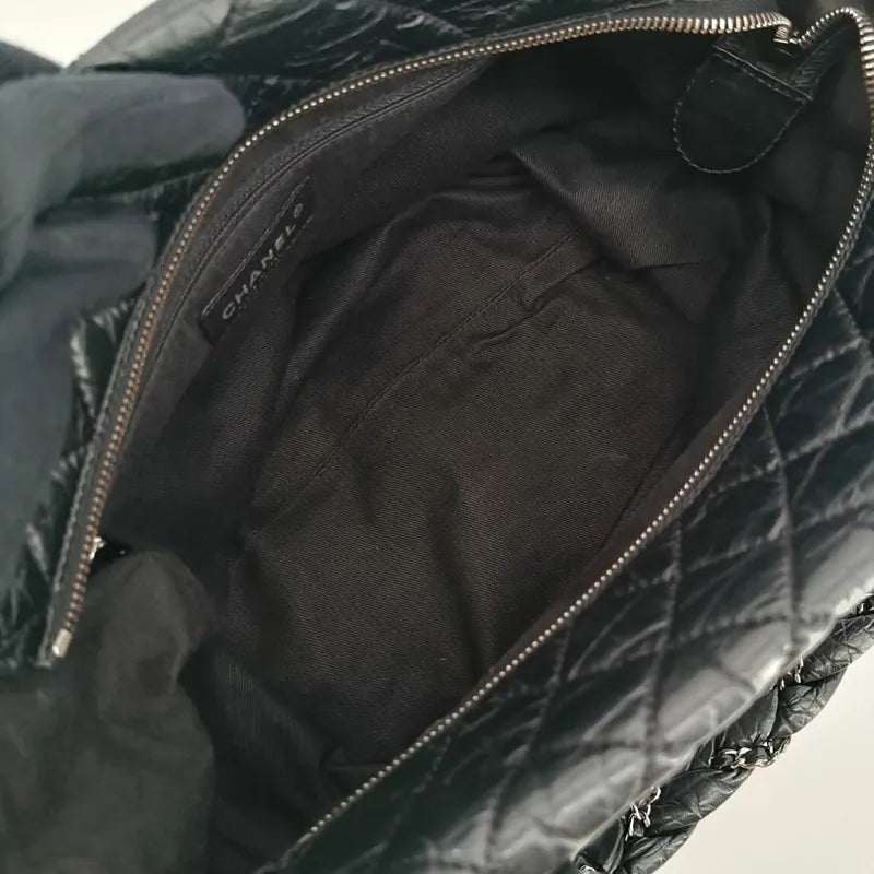 ra660-chanel-vintage-black-calfskin-lady-braid-tote-bag