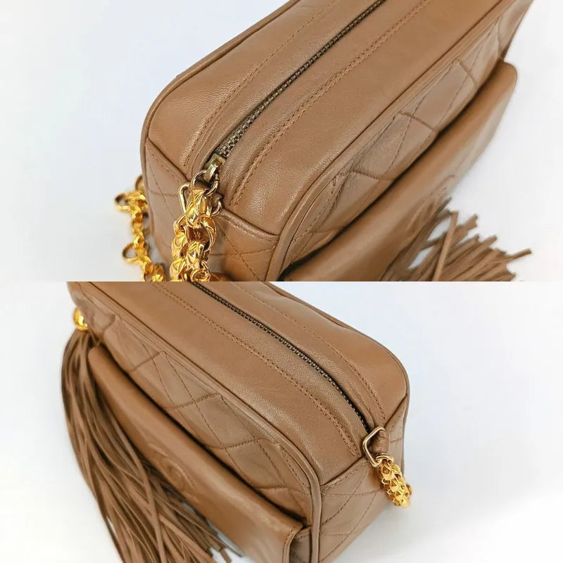 jt421-chanel-vintage-beige-lambskin-tassels-gold-chain-camera-bag