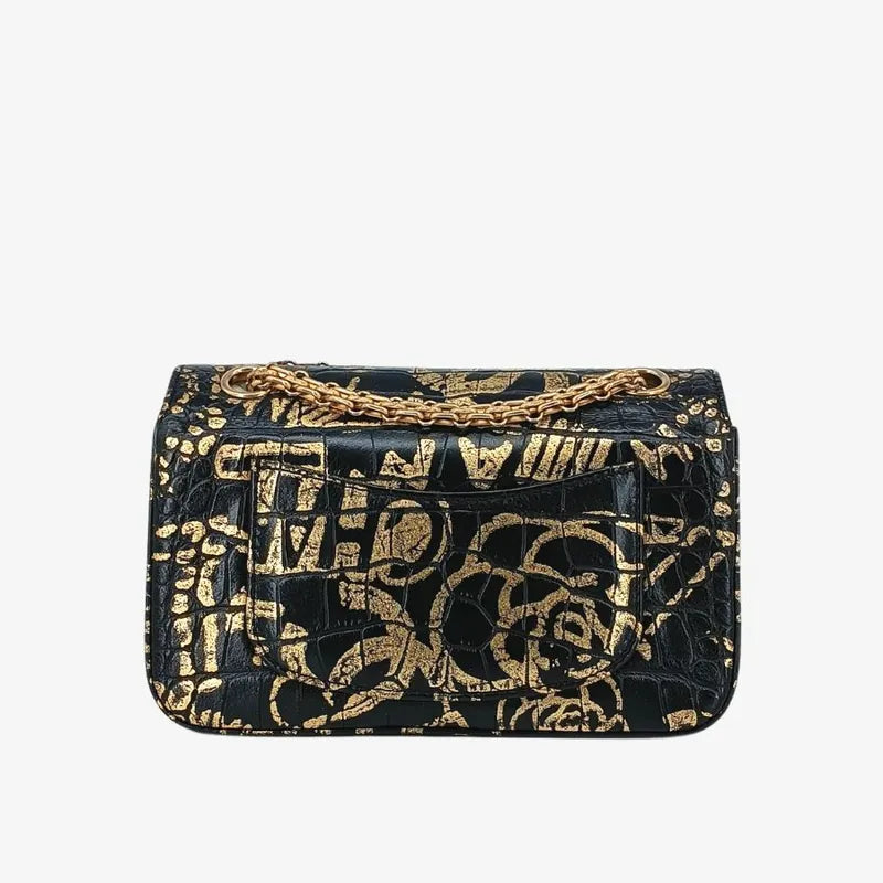90190312-chanel-black-and-gold-graffiti-calfskin-crocodile-embossed-255-flap-bag
