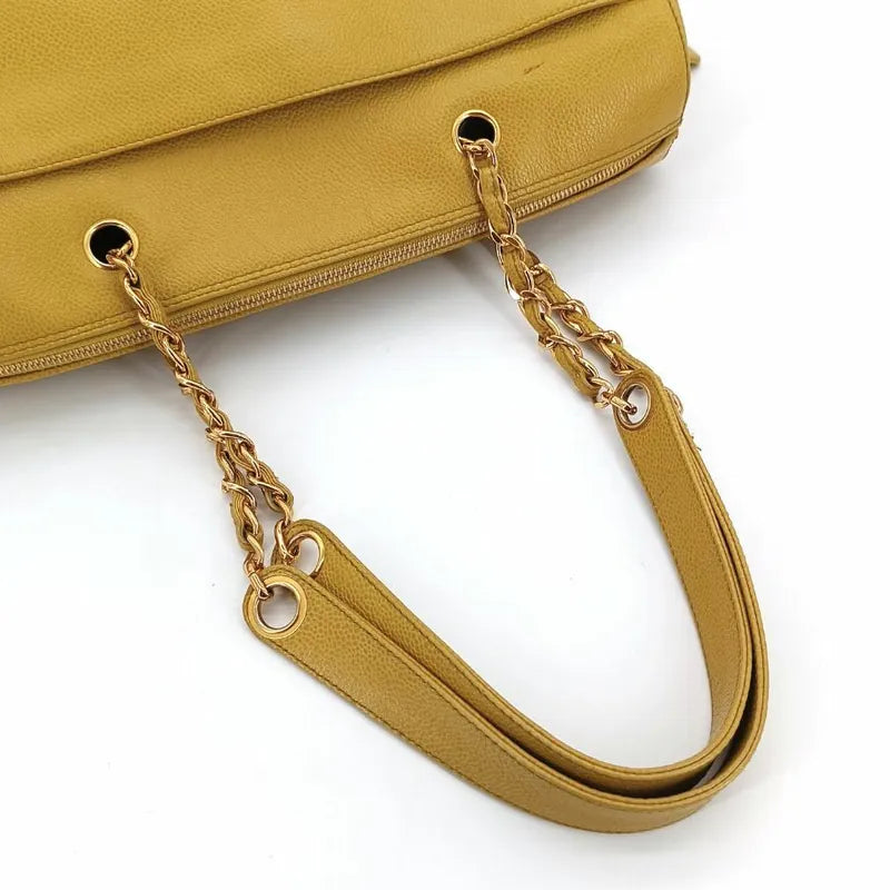 js337-chanel-vintage-yellow-caviar-leather-embossed-logo-tote-bag