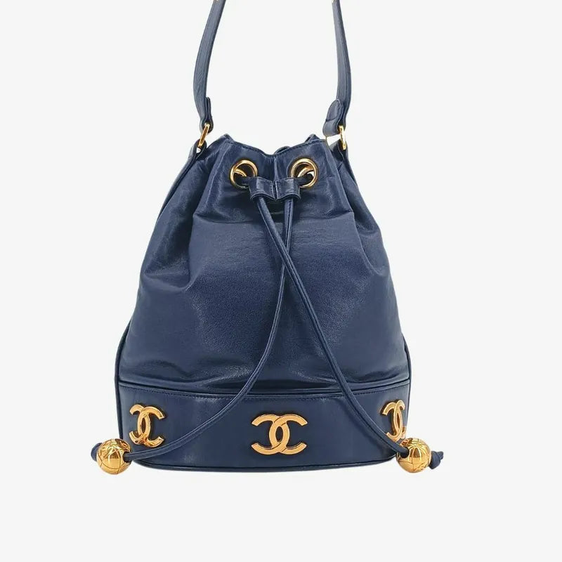 jah154-chanel-vintage-navy-lambskin-gold-ball-bucket-bag