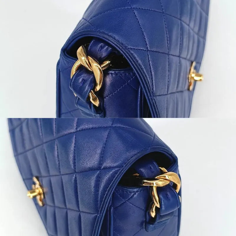 90201290-chanel-vintage-blue-lambskin-flap-bag