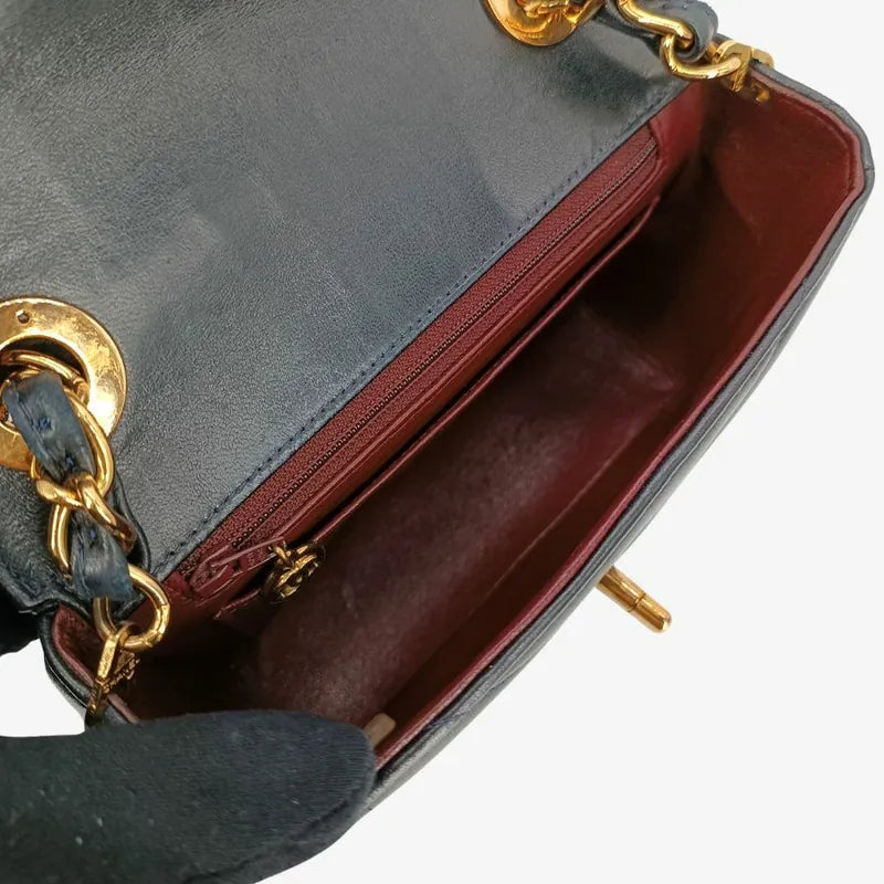 c407-chanel-vintage-navy-lambskin-chevron-mini-flap-bag