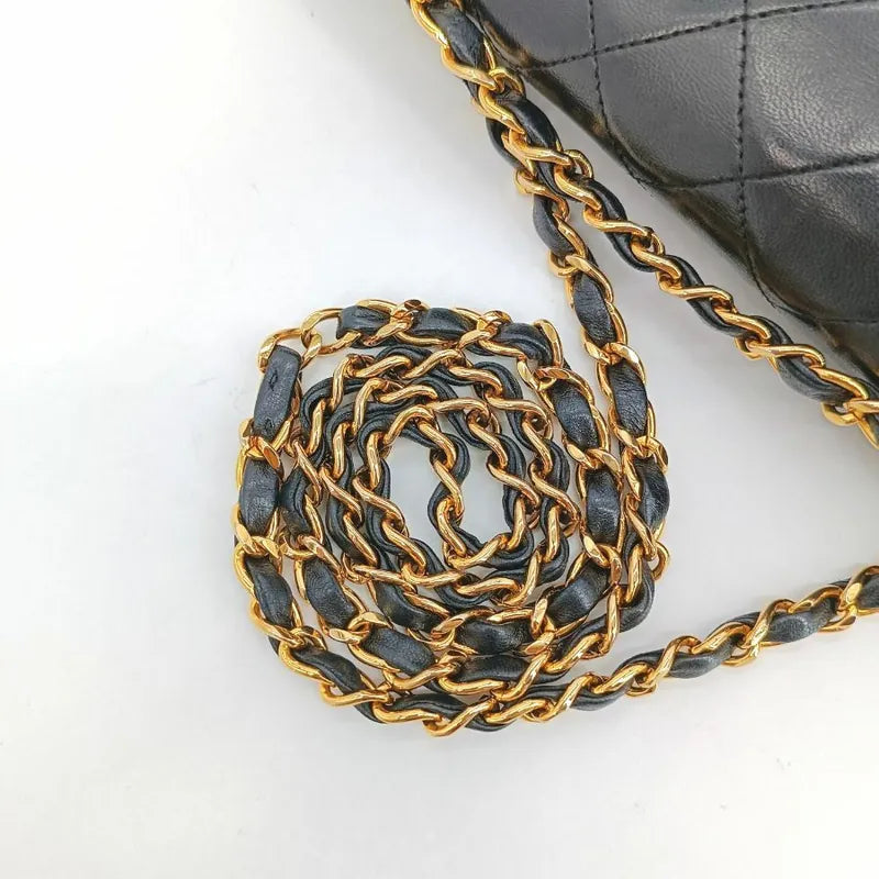 c442-chanel-vintage-black-lambskin-quilted-flap-bag