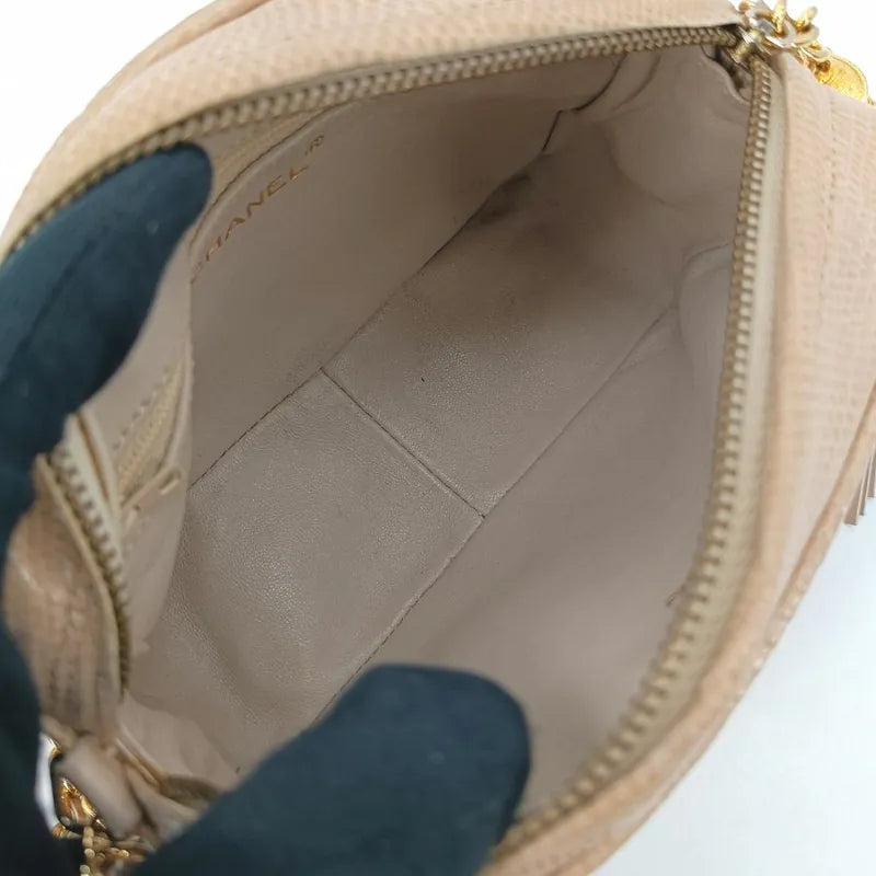 jah164-chanel-vintage-pink-lizard-skin-tassel-camera-bag