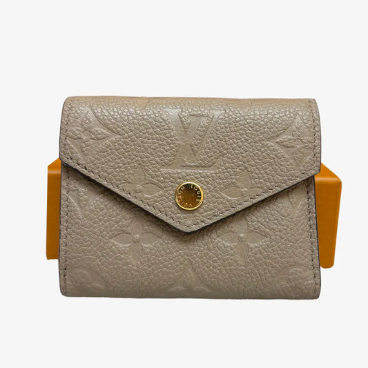 C613 - LOUIS VUITTON Grey Monogram Empreinte Zoé Wallet