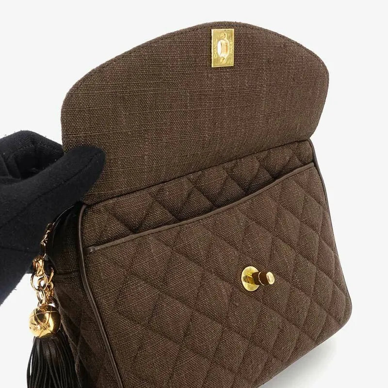 js011-chanel-vintage-brown-linen-gold-chain-camera-bag