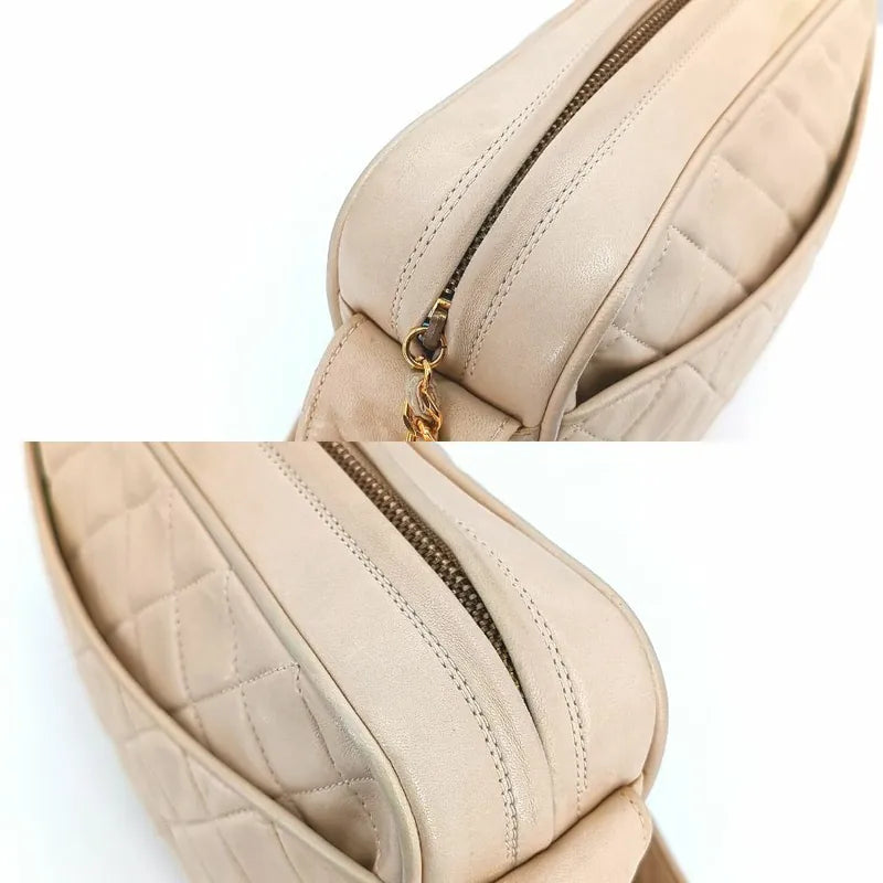 ra236-chanel-vintage-beige-lambskin-tessel-camera-bag