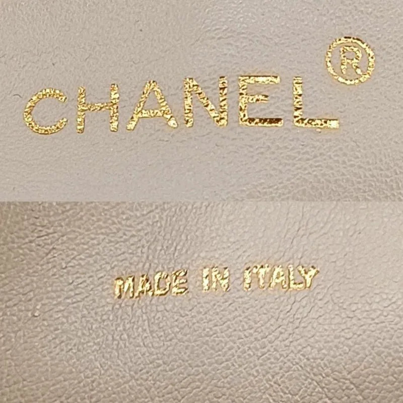 ra160-chanel-vintage-green-lizard-skin-tassel-camera-bag