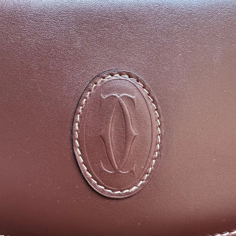 re125-cartier-vintage-burgundy-calfskin-must-de-shoulder-bag