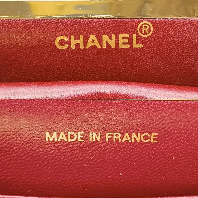 js707-chanel-vintage-black-lambskin-chevron-handbag