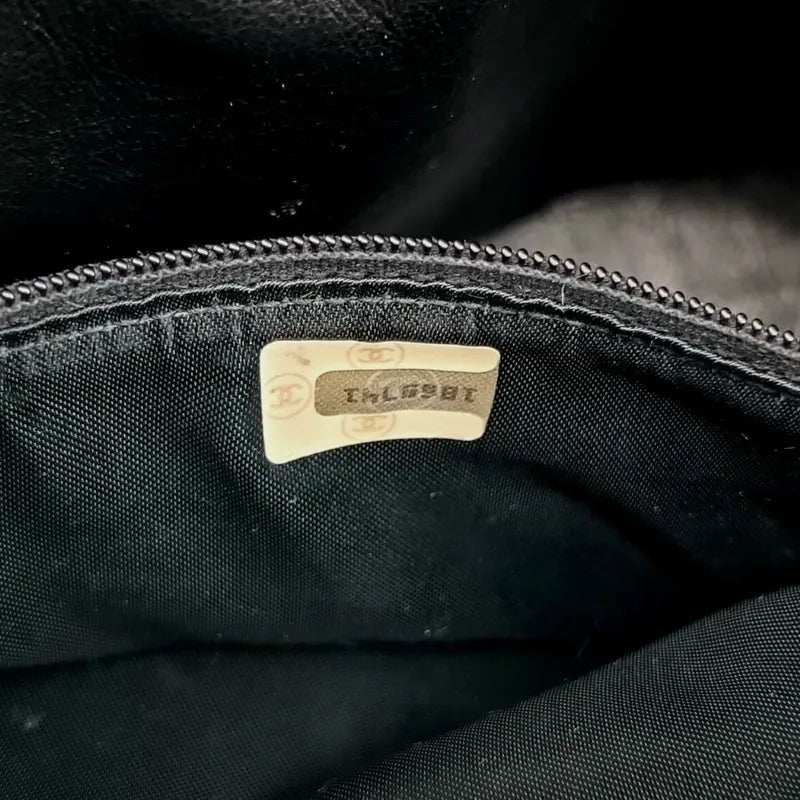 jr540-chanel-vintage-black-lambskin-tassel-camera-bag