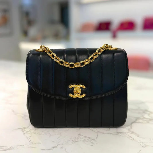 rc769-chanel-vintage-black-lambskin-vertical-gold-chain-flap-bag