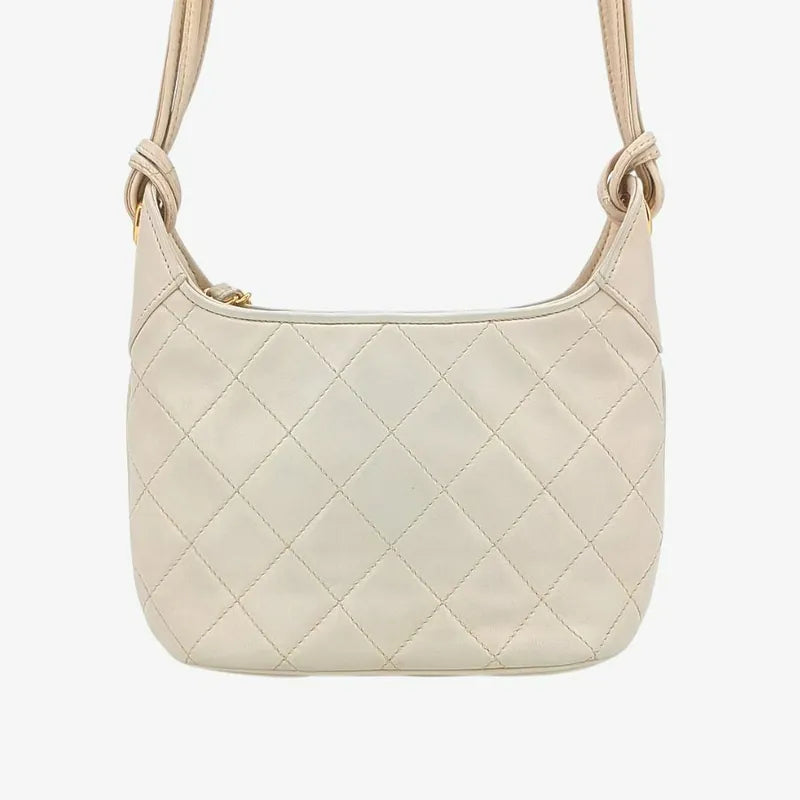 jah165-chanel-vintage-beige-lambskin-quilted-camera-bag