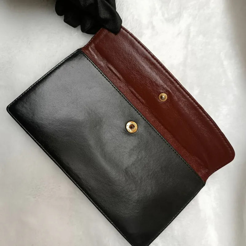 jx099-chanel-vintage-black-lambskin-pouch