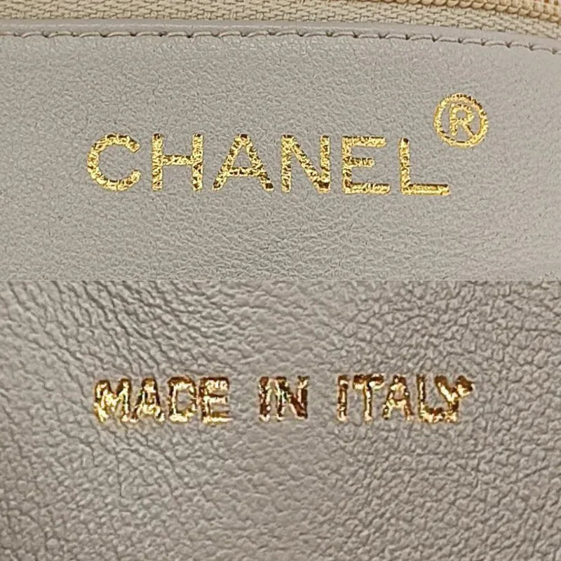 ra999-chanel-vintage-beige-lambskin-quilted-camera-bag