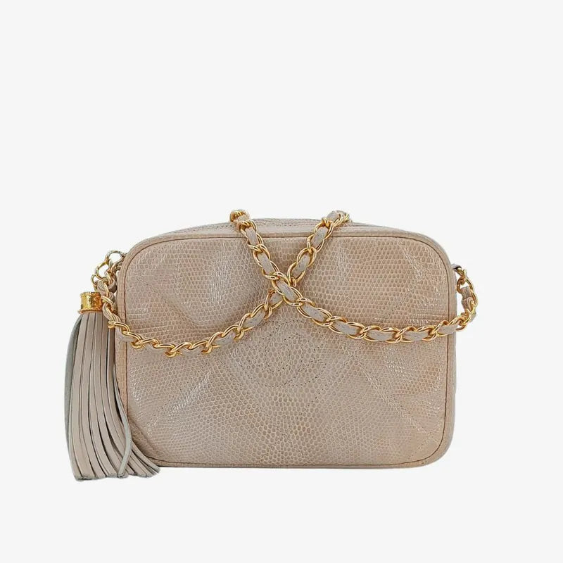 jah164-chanel-vintage-pink-lizard-skin-tassel-camera-bag