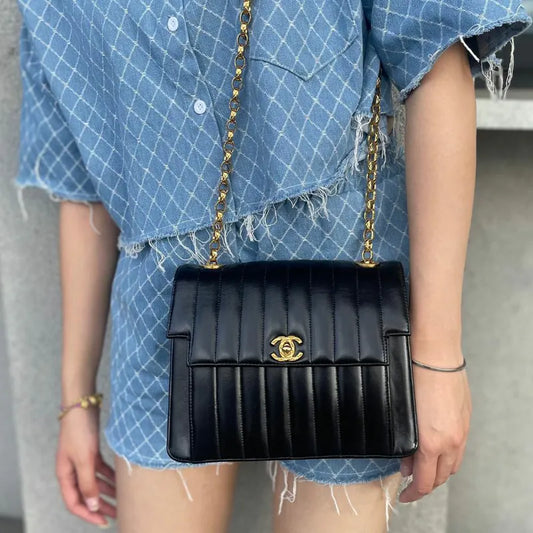 ju296-chanel-vintage-black-lambskin-vertical-gold-chain-flap-bag