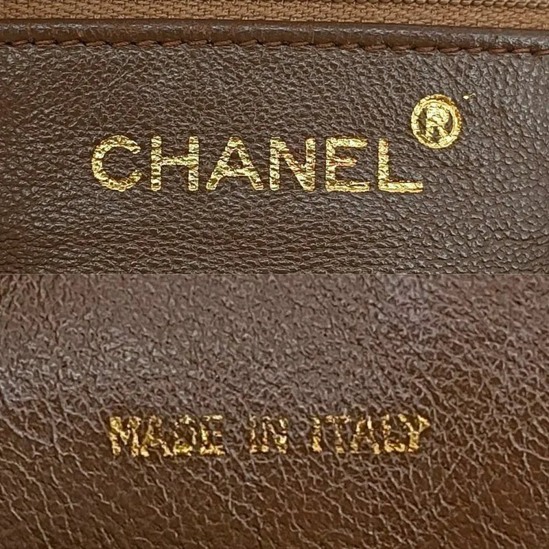 jah173-chanel-vintage-beige-lambskin-tassel-camera-bag