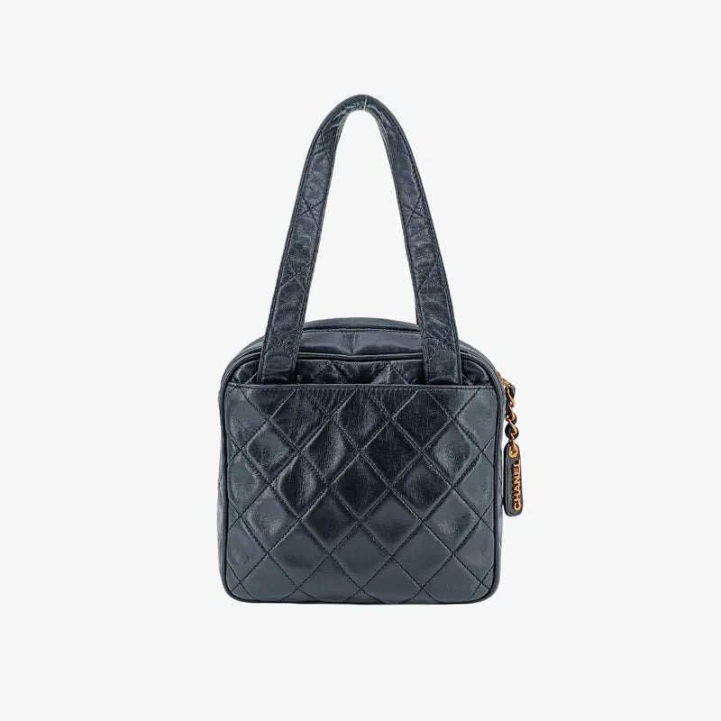 ju691-chanel-vintage-black-lambskin-quilted-handbag