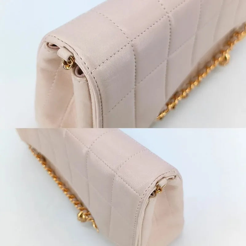 jah113-chanel-vintage-pink-lambskin-chocolate-bar-charms-flap-bag