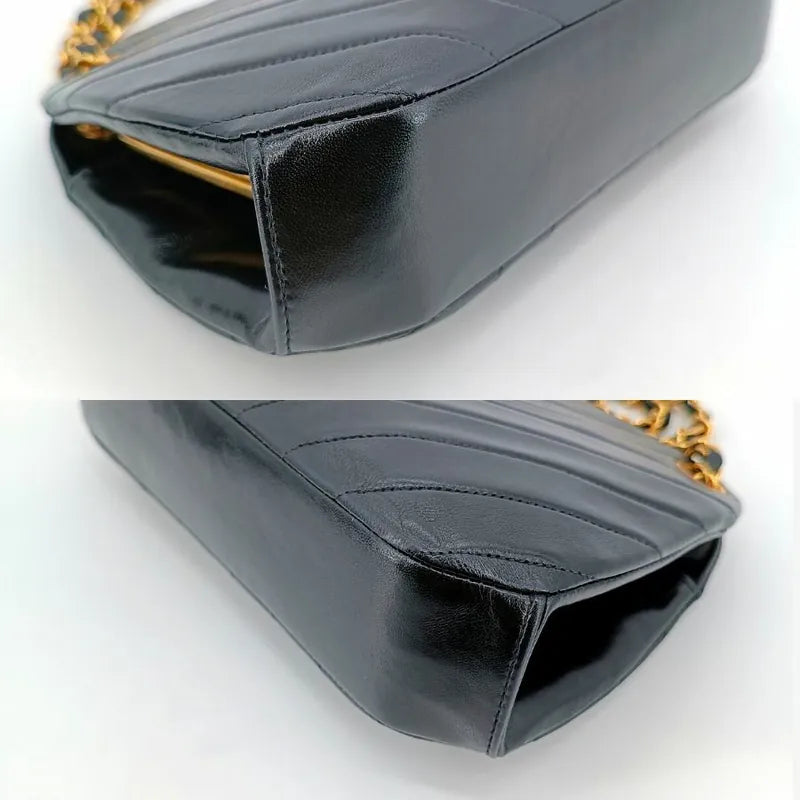 jt293-chanel-vintage-black-lambskin-chevron-handbag