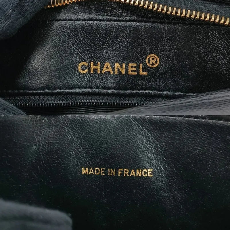 ra202-chanel-vintage-black-caviar-leather-quilted-camera-bag