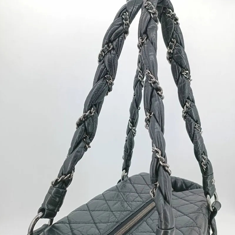 ra660-chanel-vintage-black-calfskin-lady-braid-tote-bag