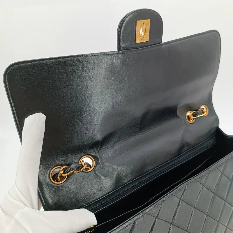 jah169-chanel-vintage-black-lambskin-jumbo-classic-flap-bag