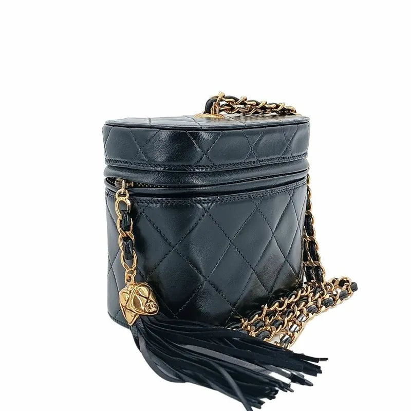 c302-chanel-vintage-black-lambskin-tassel-bucket-bag