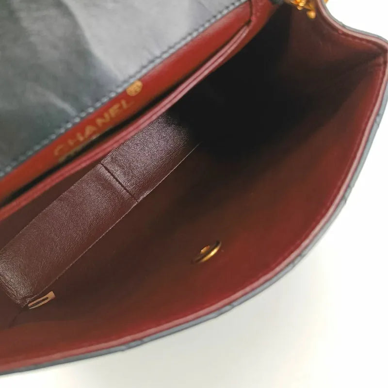 js402-chanel-vintage-black-lambskin-trapezoid-flap-bag