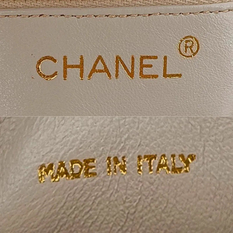 ra862-chanel-vintage-beige-lambskin-tassel-camera-bag