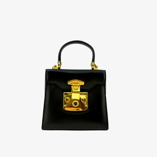 jah209-gucci-vintage-black-leather-kelly-mini-shoulder-bag