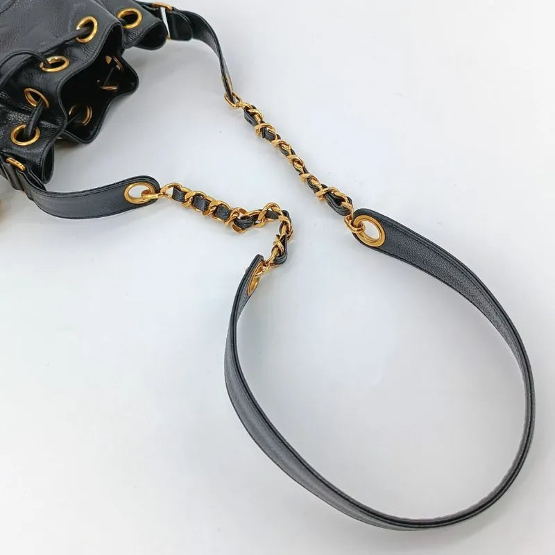 c457-chanel-vintage-black-caviar-leather-golden-ball-mini-bucket-bag