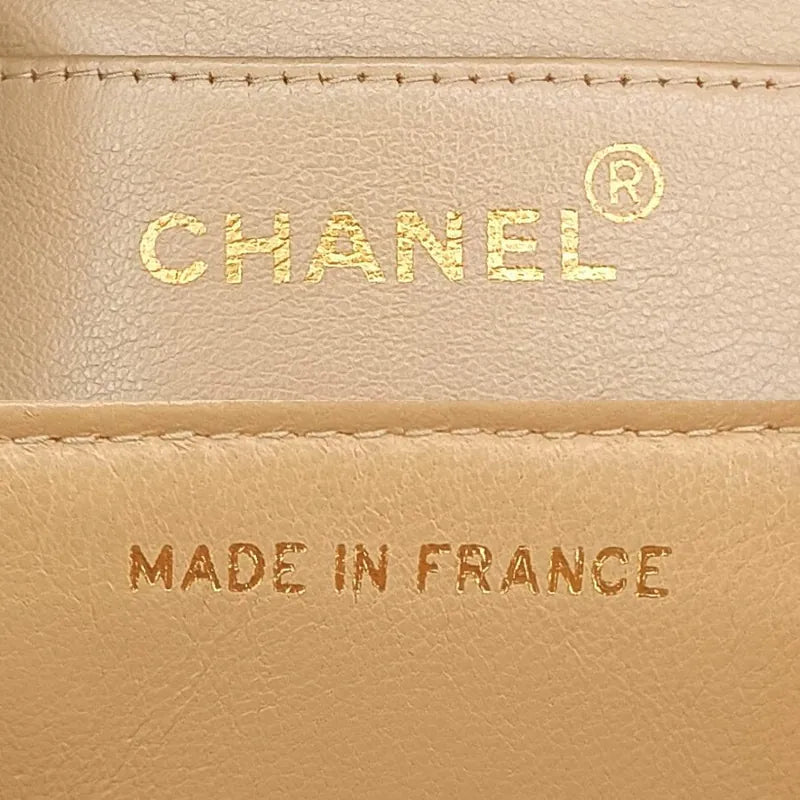 ra504-chanel-vintage-beige-lambskin-gold-chain-flap-bag