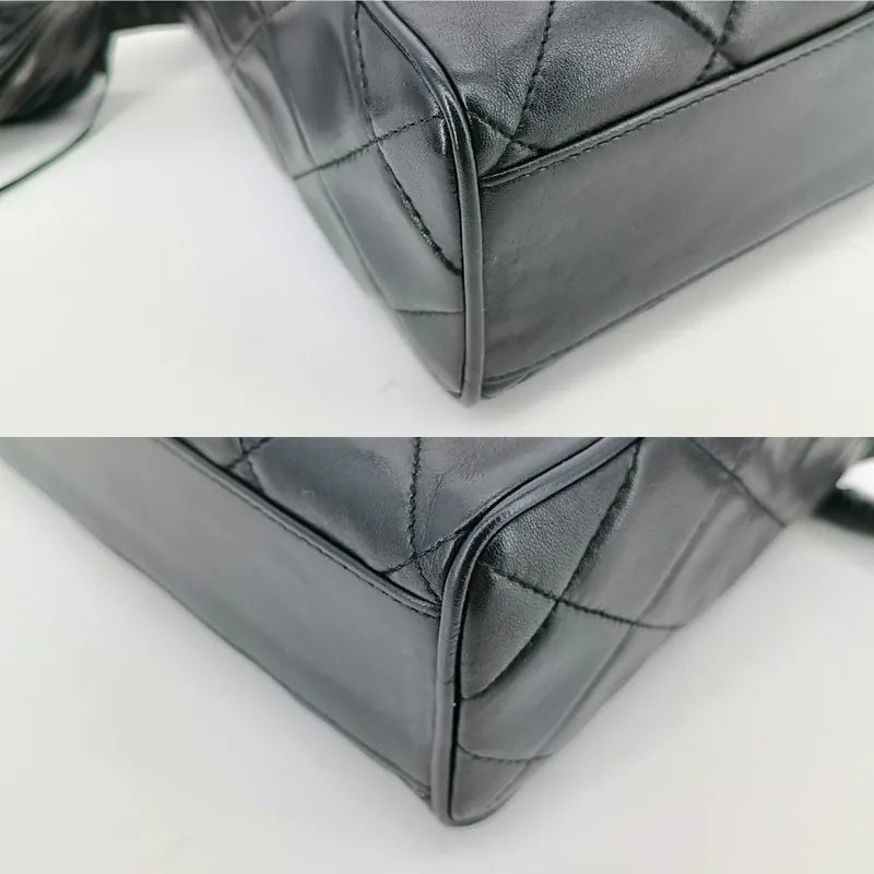 ju947-chanel-vintage-black-lambskin-quilted-camera-bag