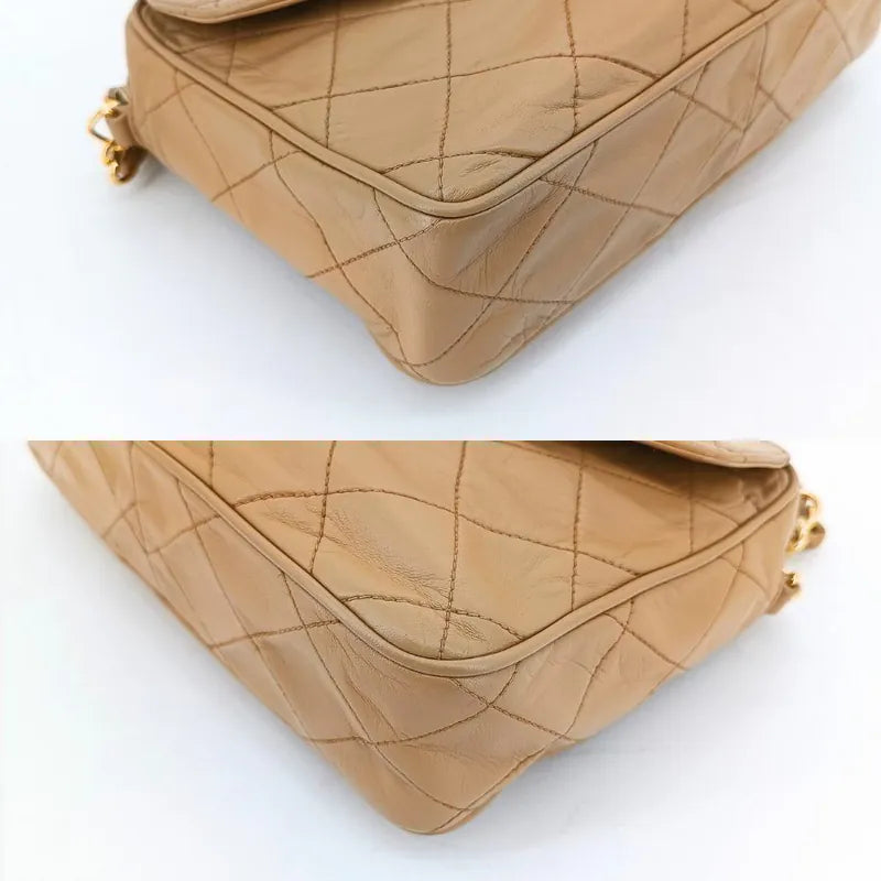 jah173-chanel-vintage-beige-lambskin-tassel-camera-bag