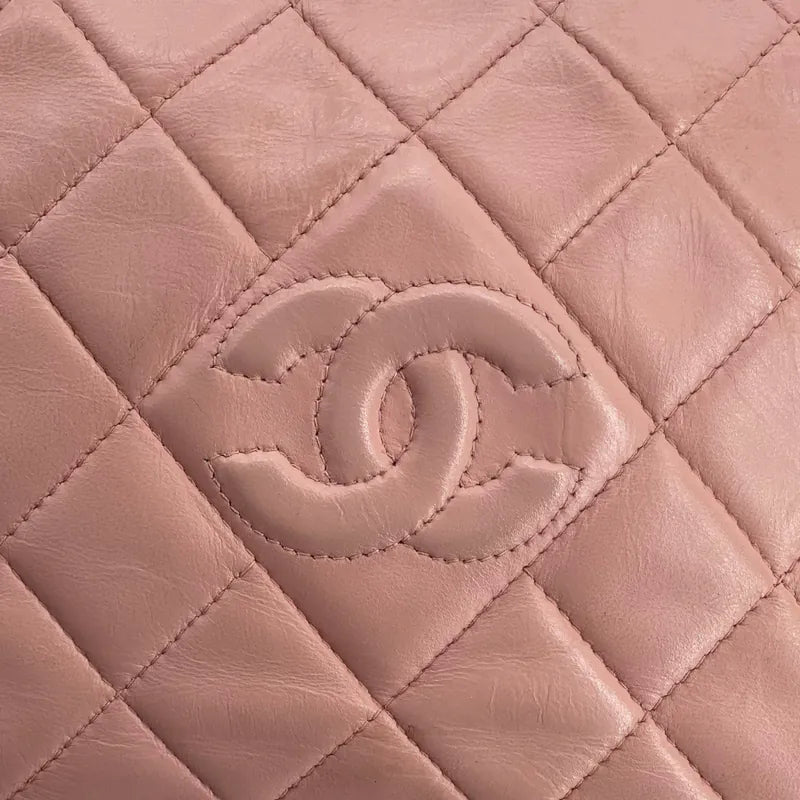 c566-chanel-vintage-pink-lambskin-camera-bag