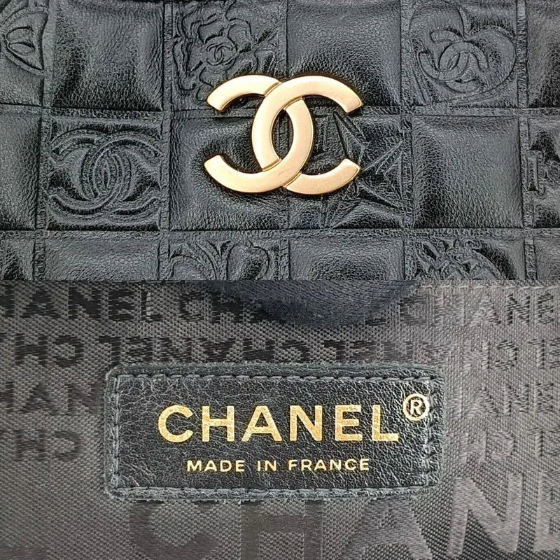 ra372-chanel-vintage-black-lambskin-precious-symbols-embossed-tote-bag