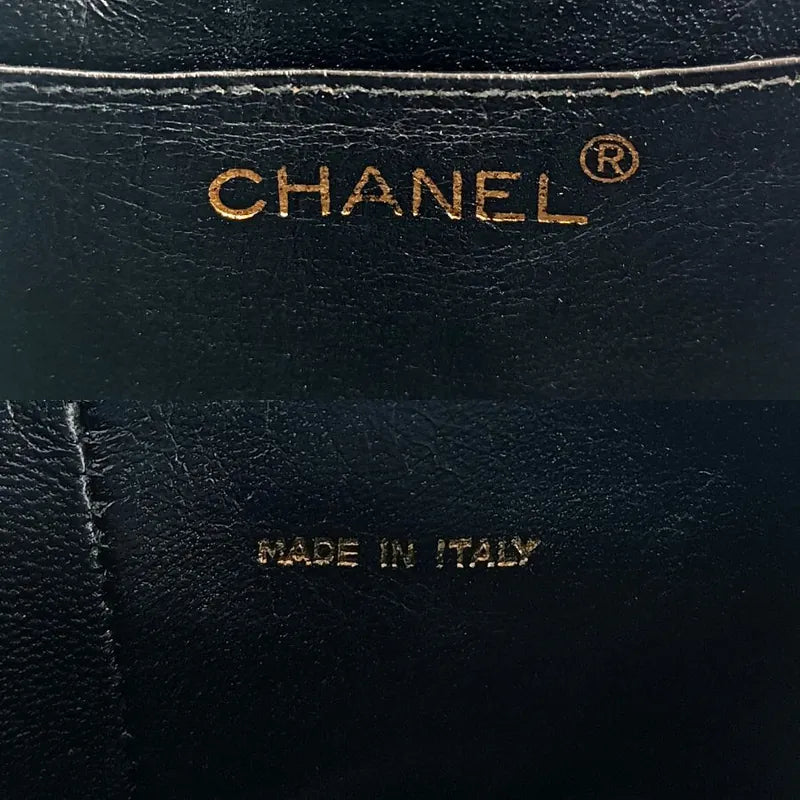 c302-chanel-vintage-black-lambskin-tassel-bucket-bag