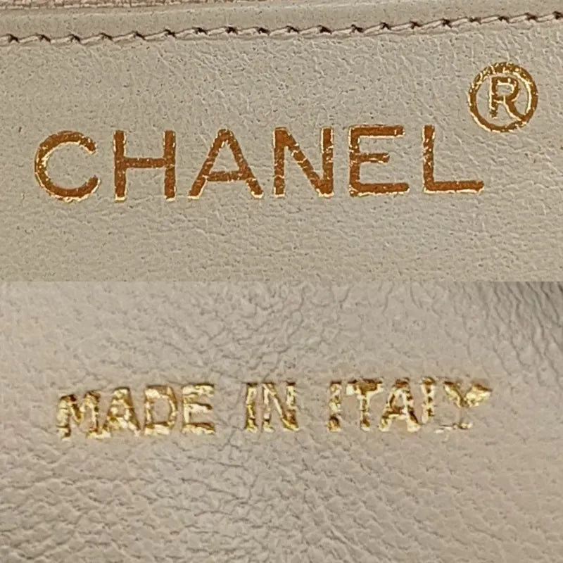 ra968-chanel-vintage-beige-lambskin-tassel-camera-bag