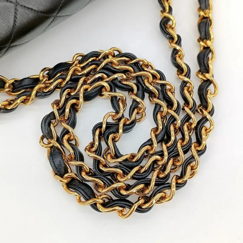 c309-chanel-vintage-black-lambskin-maxi-classic-flap-bag