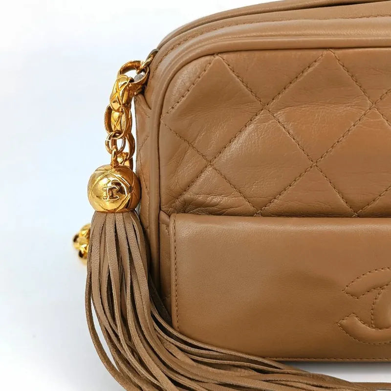 jt421-chanel-vintage-beige-lambskin-tassels-gold-chain-camera-bag