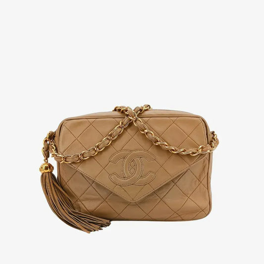 jah173-chanel-vintage-beige-lambskin-tassel-camera-bag