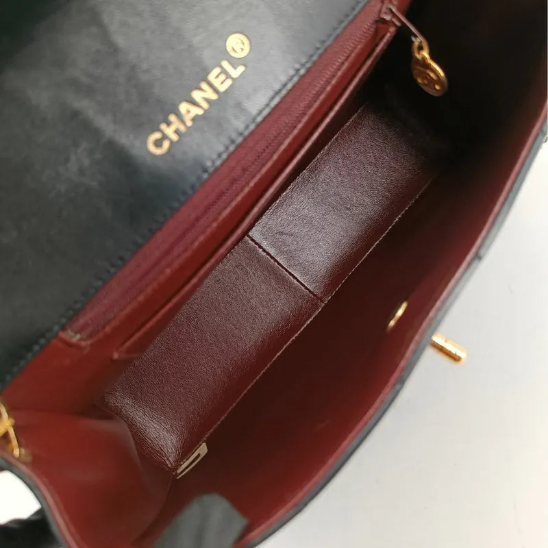 jah196-chanel-vintage-black-lambskin-trapezoid-flap-bag