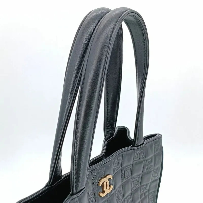 ra372-chanel-vintage-black-lambskin-precious-symbols-embossed-tote-bag