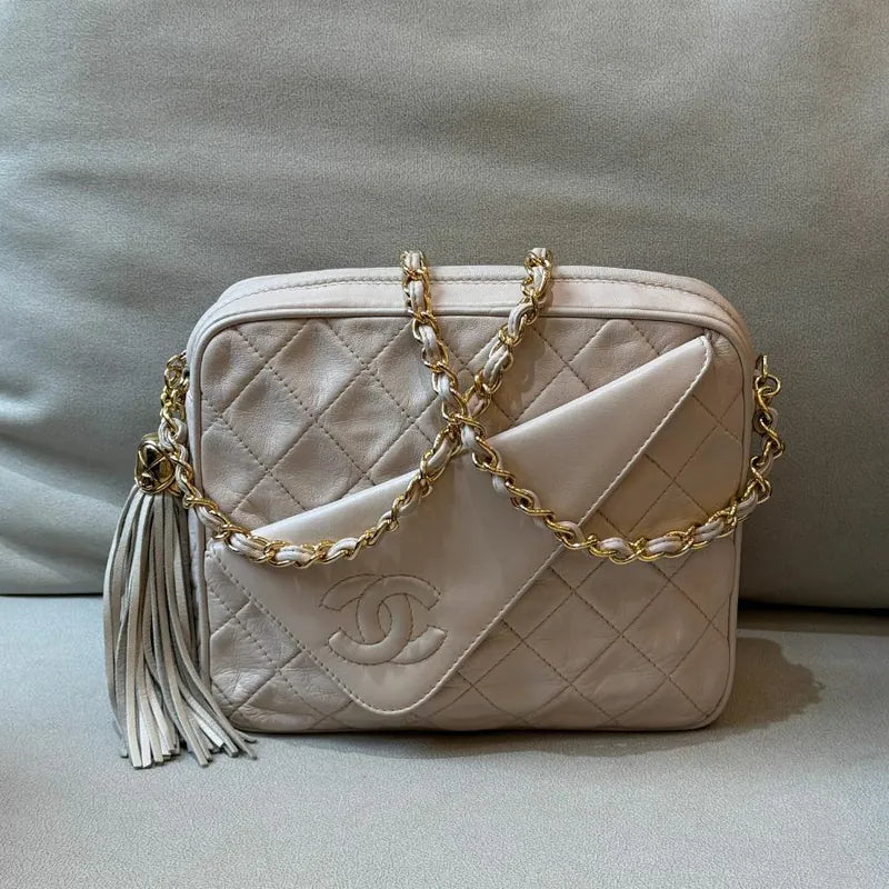 jx330-chanel-vintage-beige-lambskin-quilted-camera-bag