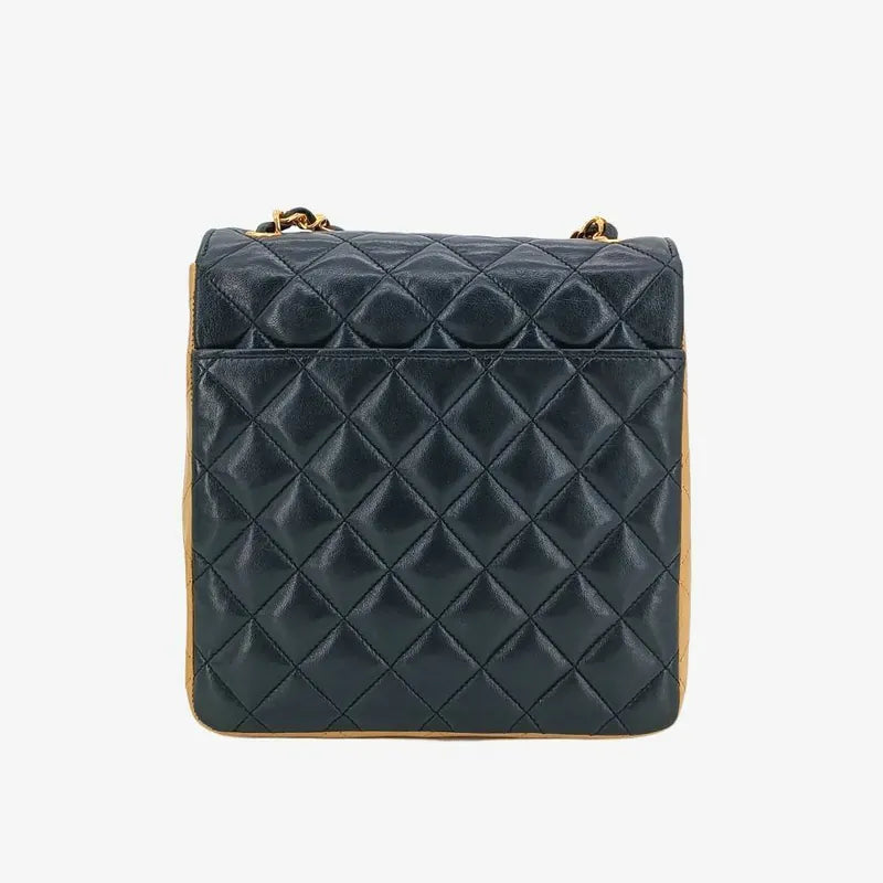 90211153-chanel-vintage-beige-black-lambskin-quilted-flap-bag