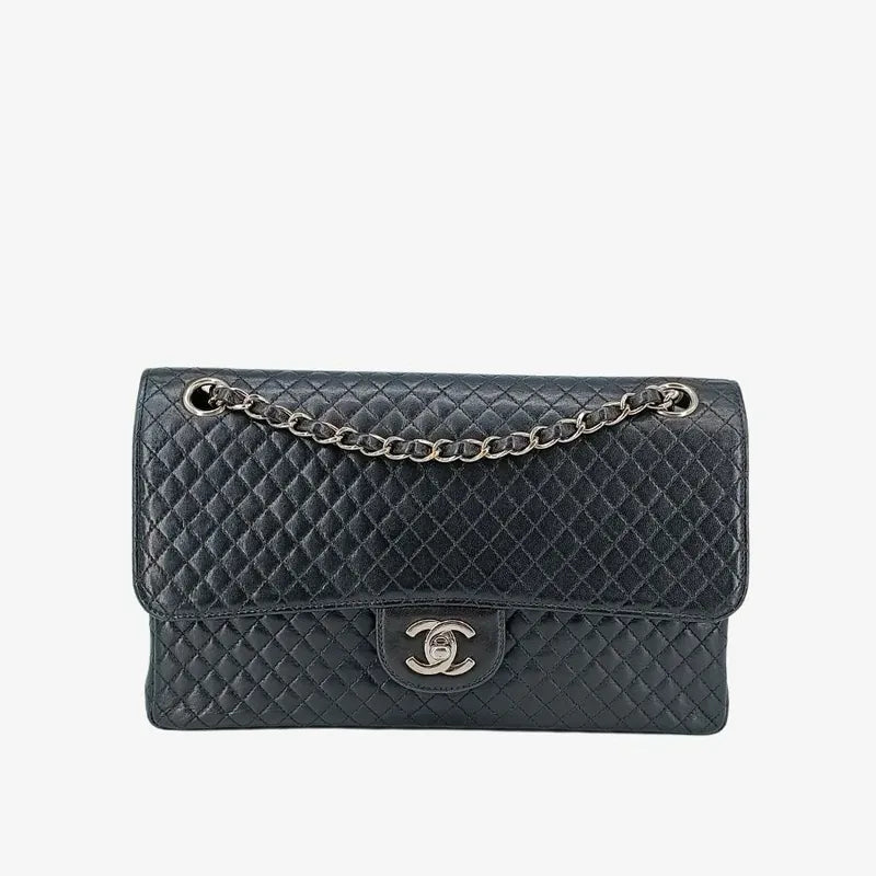 90201267-chanel-vintage-black-lambskin-quilted-flap-bag