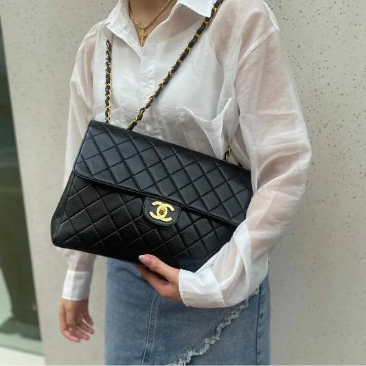 jah169-chanel-vintage-black-lambskin-jumbo-classic-flap-bag
